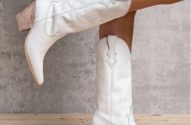 Girl with white cowgirl boot