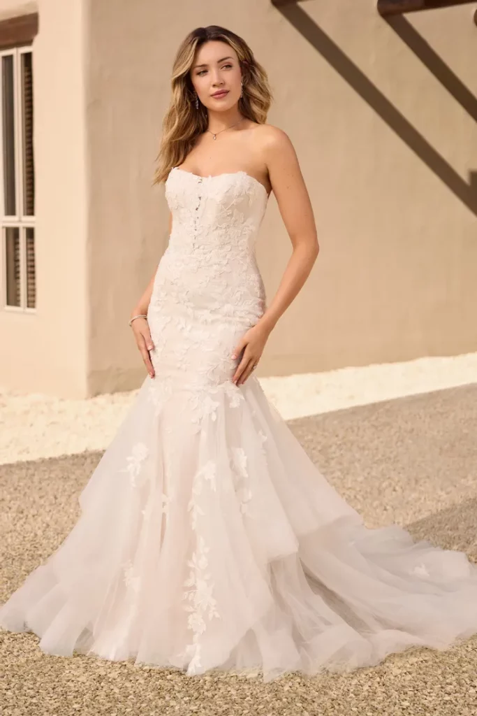 Unveiling Elegance in a Textured Mermaid Fit and Flare Wedding Dress