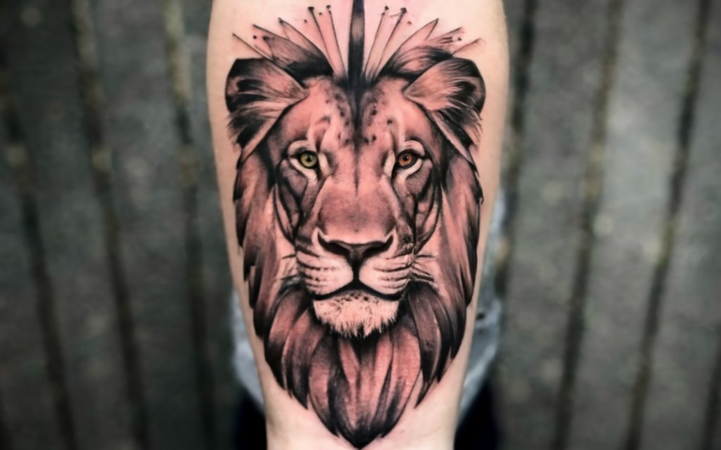 lion forearm tattoo