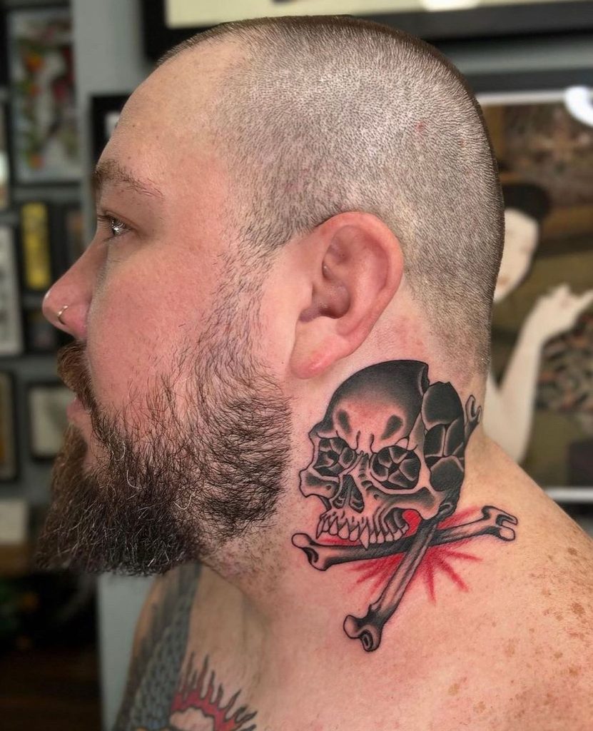 skull and crossbones neck tattoo