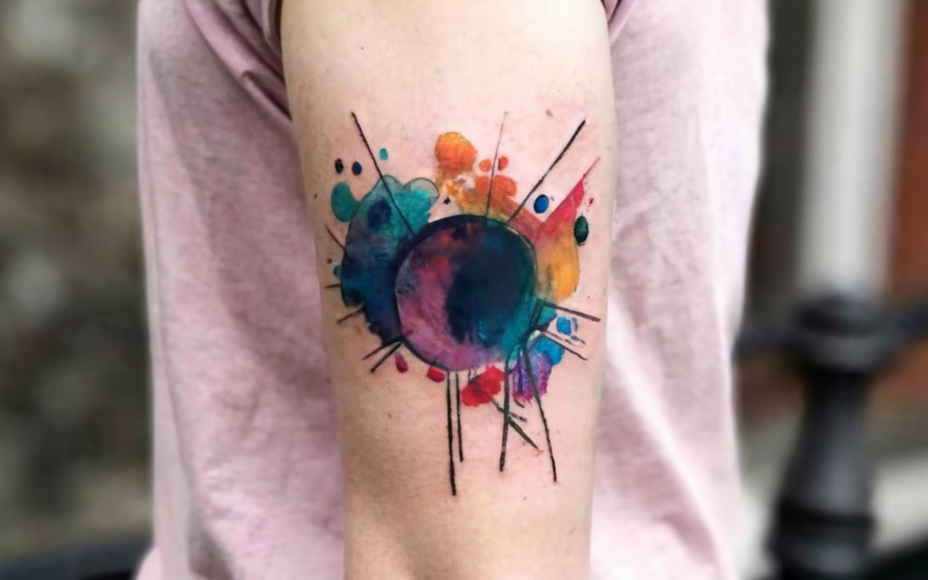 water color forearm tattoo
