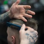 a barber hair cutting for men